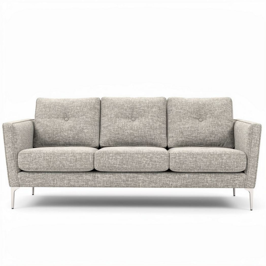 Light gray upholstered three-seater sofa with button details and metal legs